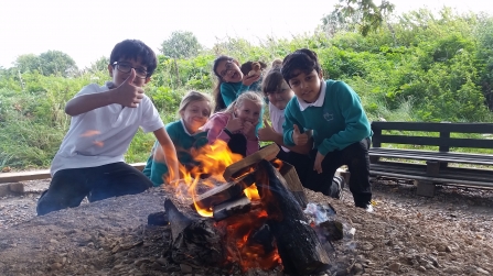 Children around the campfire 