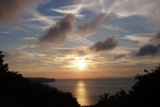 sunset over the ocean at Bucks Mill