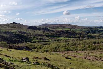 Landscape view of East Dartmoor with it's rolling green hills and farmland