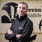 Nick Bruce-White standing in front of Devon Wildlife Trust sign