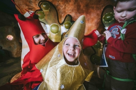 Children dressed up in a star costume at Seaton Jurassic
