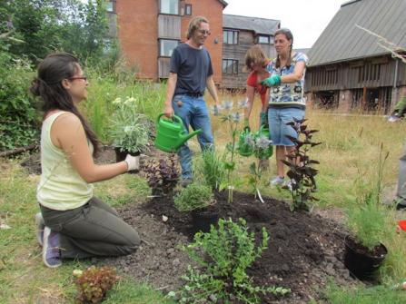 Volunteers tend the Cricklepit Mill garden