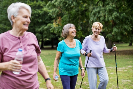 Over 55's enjoying fresh air in a park