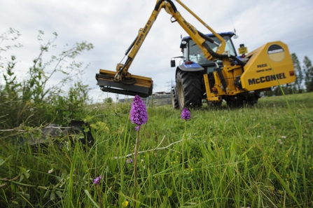 Digger on brownfield site