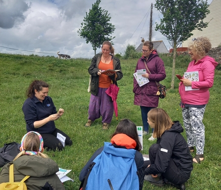 Ecologist leading a plant survey training session