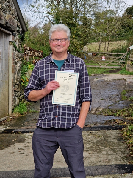 Andrew Taylor with award