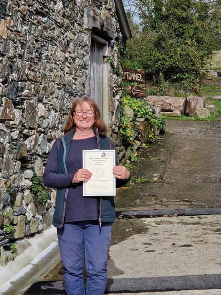 Nicky Collins with award