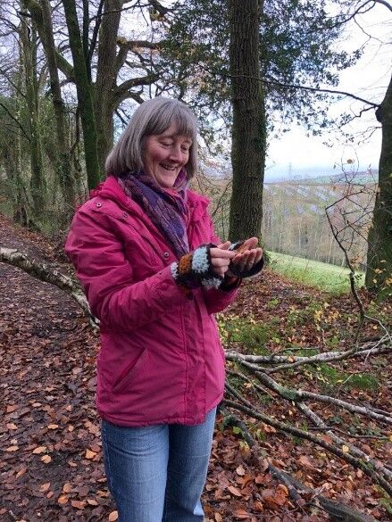 Sonia stood, smiling and looking fondly at the lichen in her hands