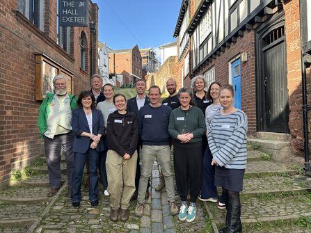 Group image of the Saving Devon's Treescapes and National Lottery Heritage Fund teams at celebration event.